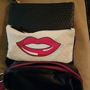 Three makeup bags